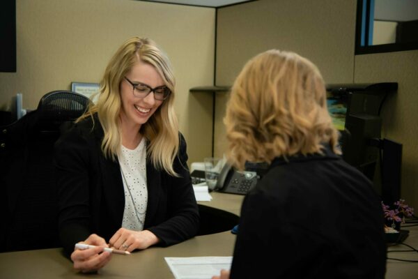 Laura helping customer
